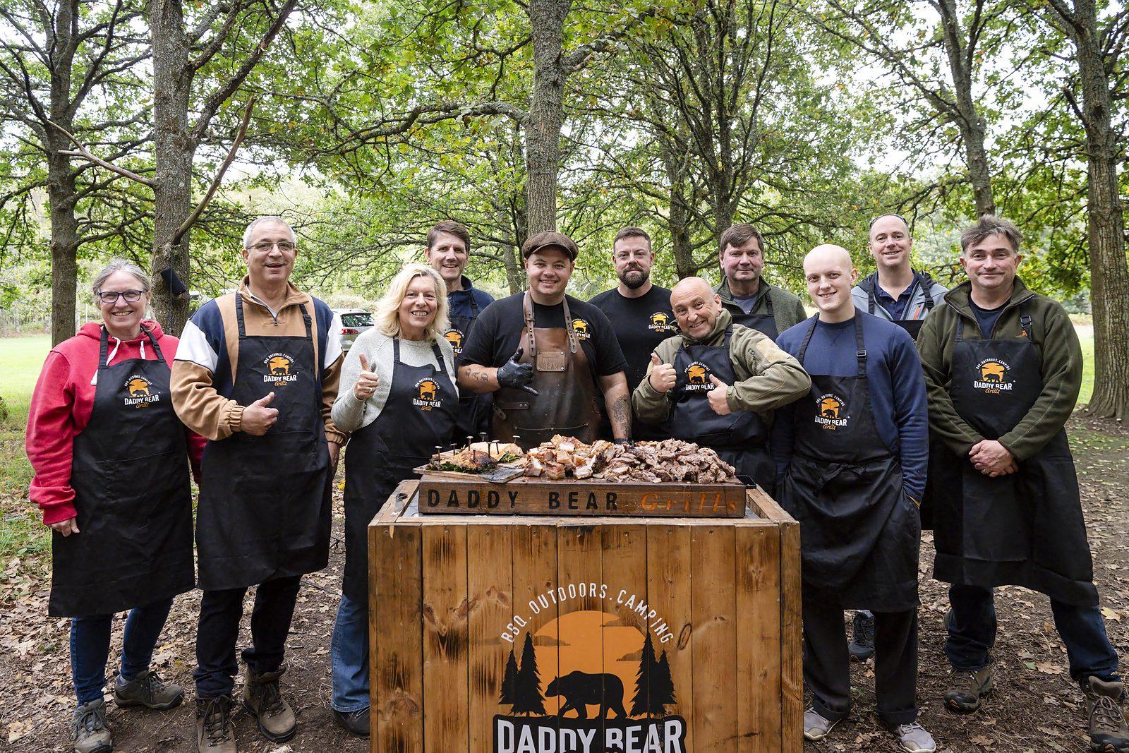 Guests at a Daddy Bear Grills live fire cooking class at Liz's Yard, Groombridge, Kent